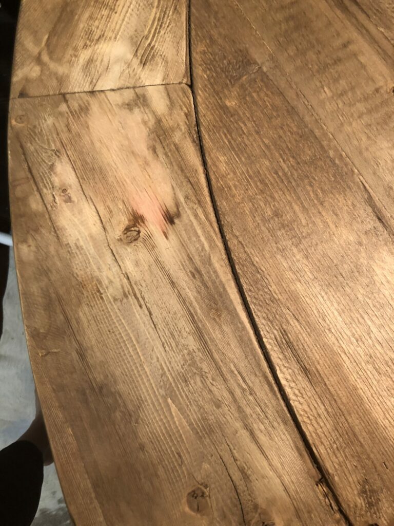 Red stain and finish coming off of RH table after trying to wipe it.